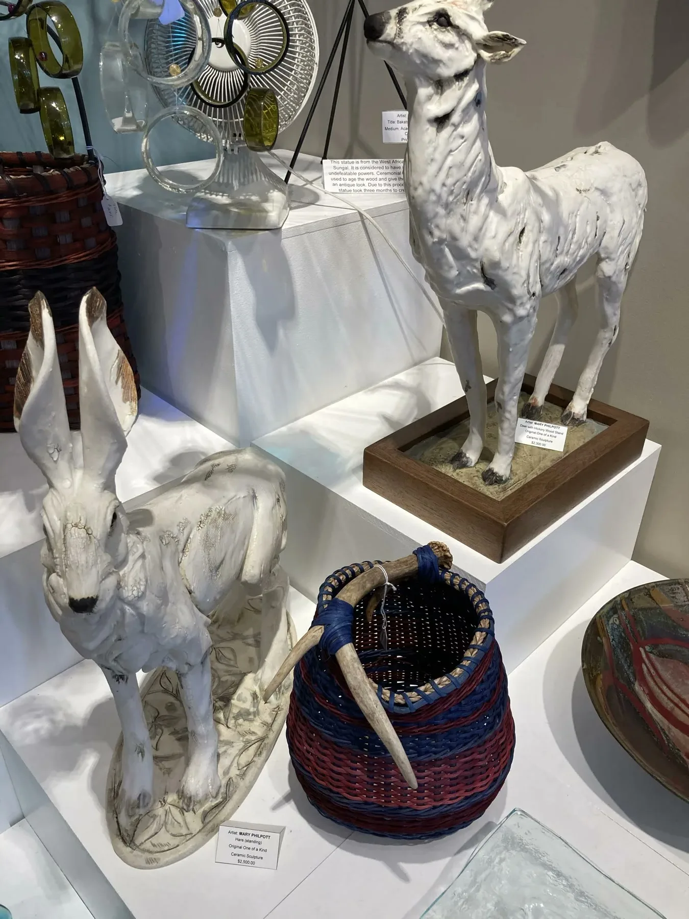 Art objects including glass and sculptures in a Bayfield gallery shop
