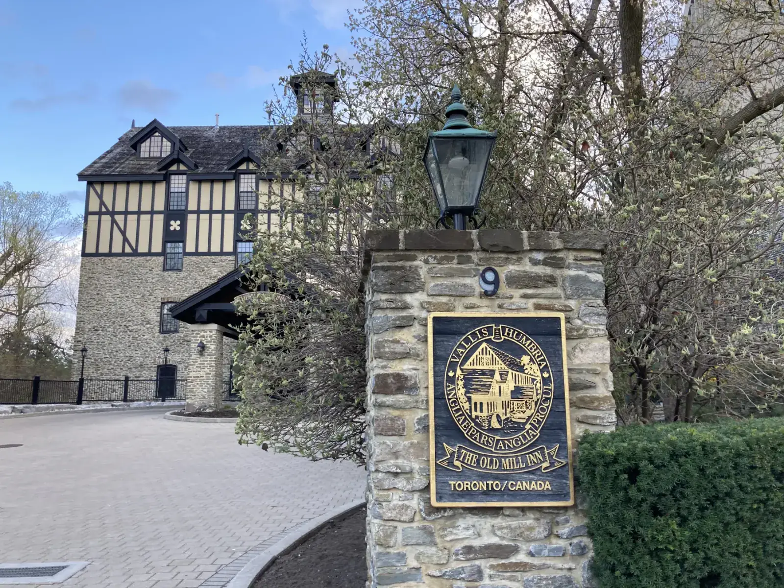 Old Mill Inn sign and stone entrance in Etobicoke Toronto