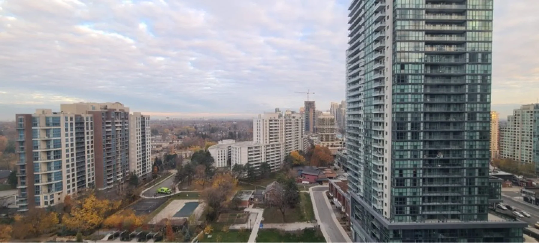 High-rise hotel room view over North York in fall