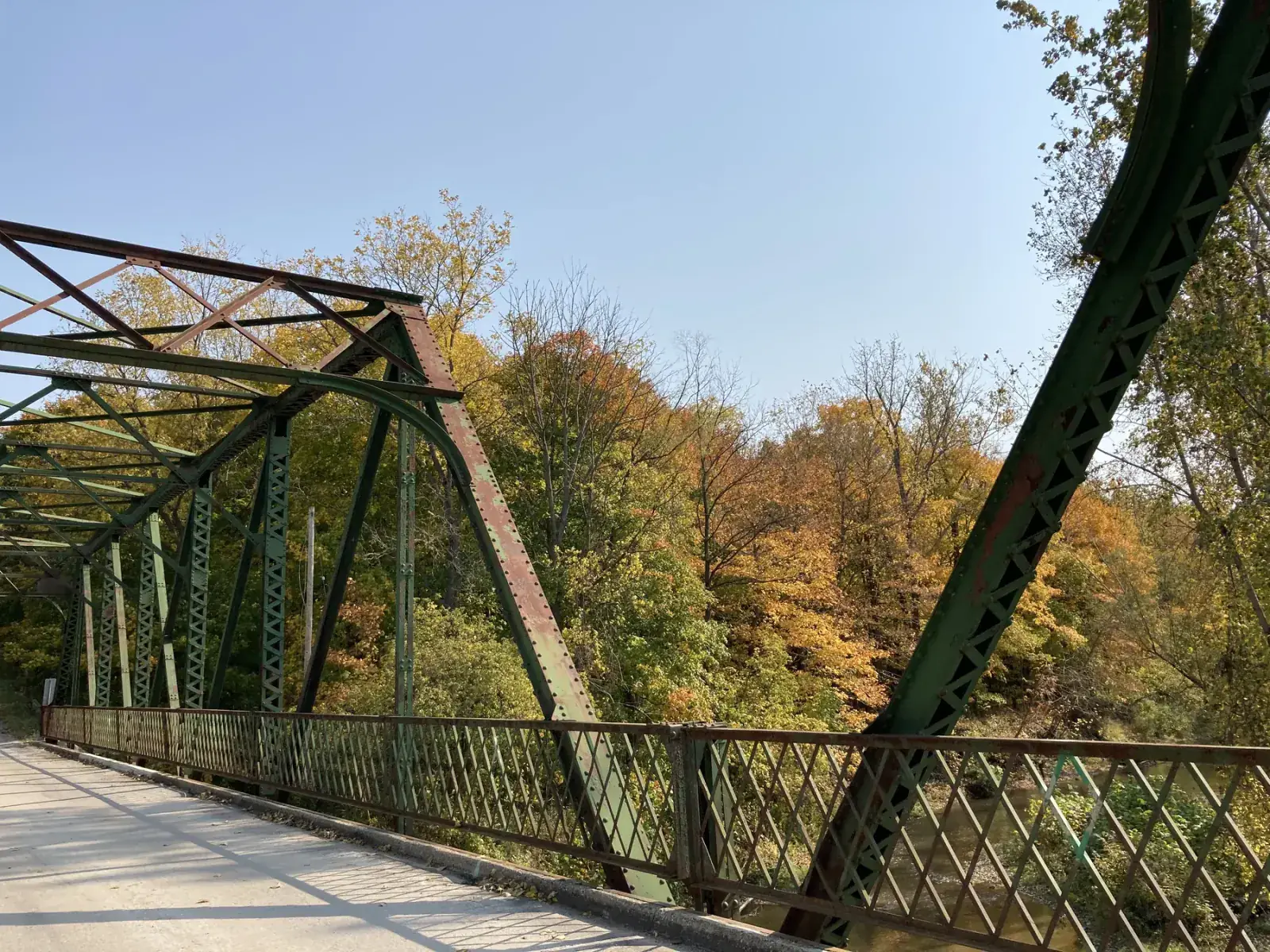 Bridge side view with autumn trees in rural Ontario