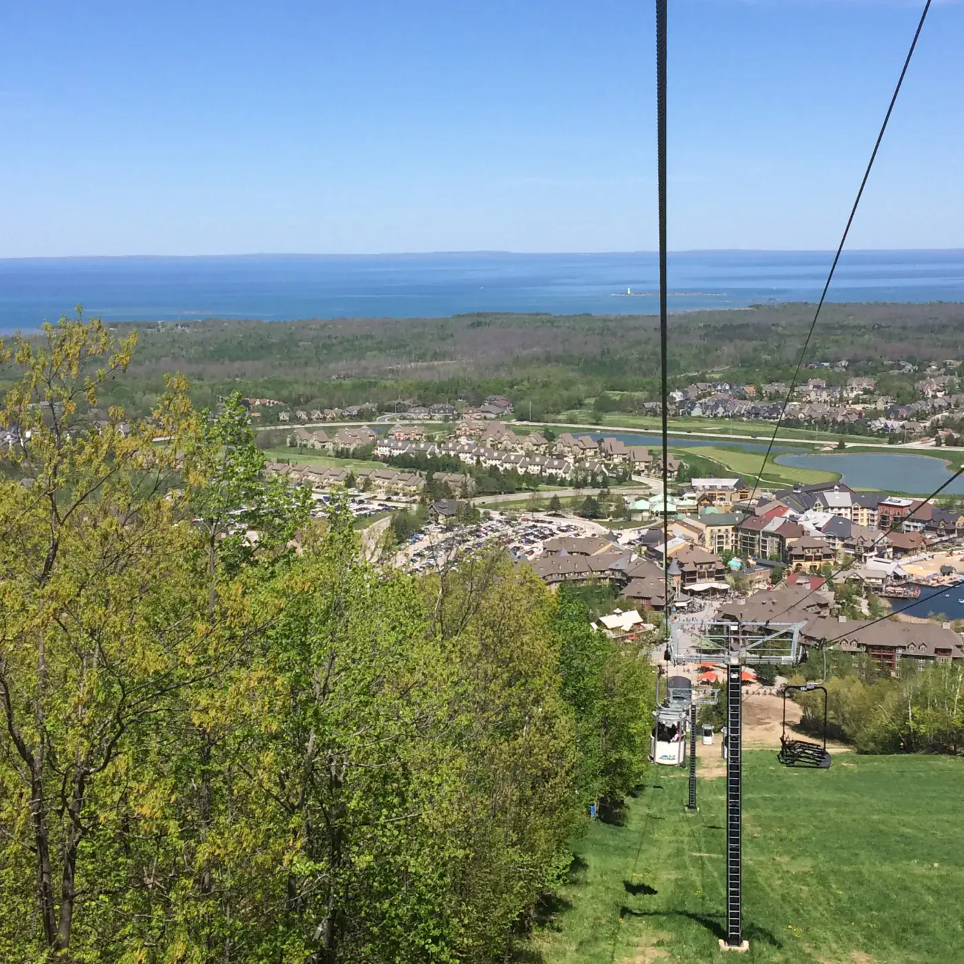 Blue Mountain lift looking over Georgian Bay and the resort village