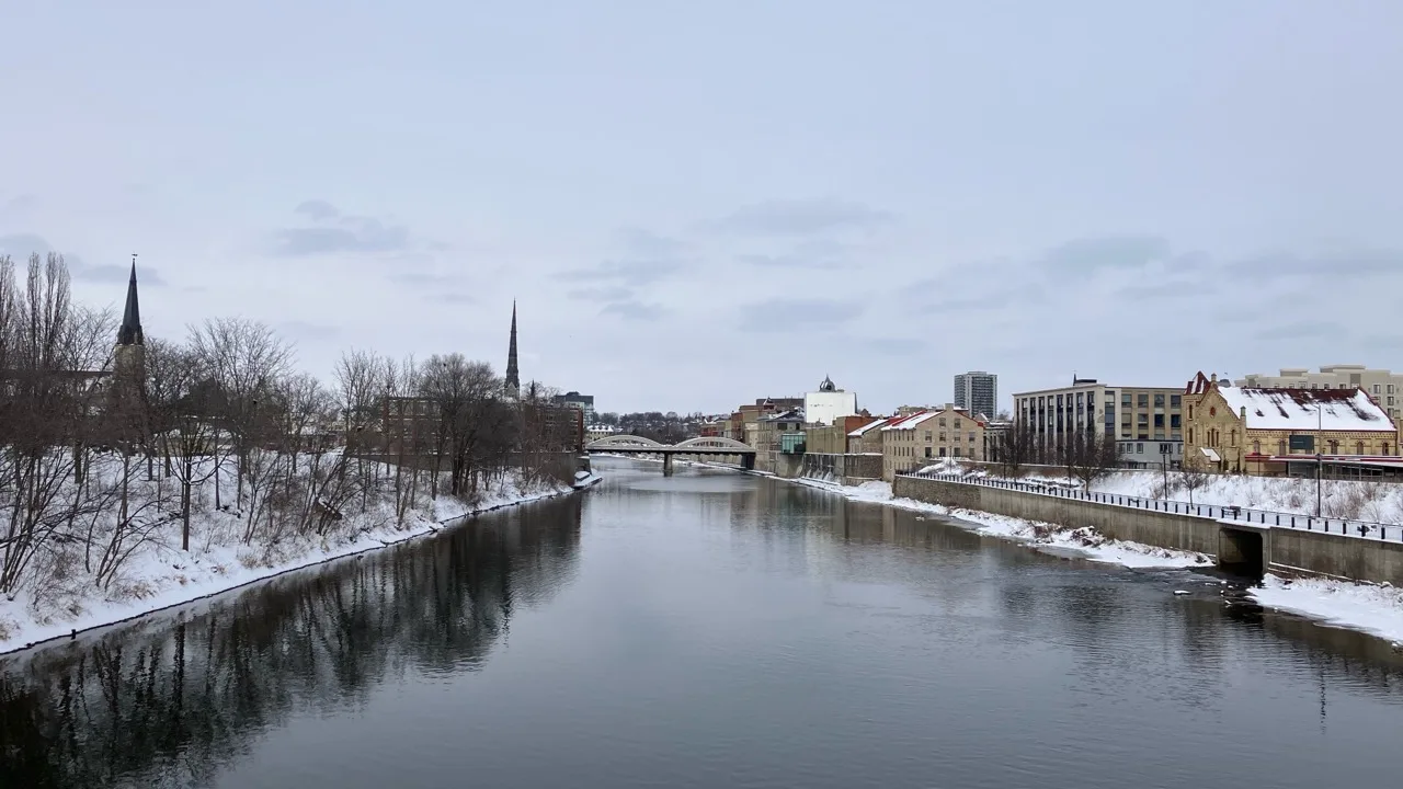 Winter view of the Grand River and historic downtown Galt in Cambridge Ontario