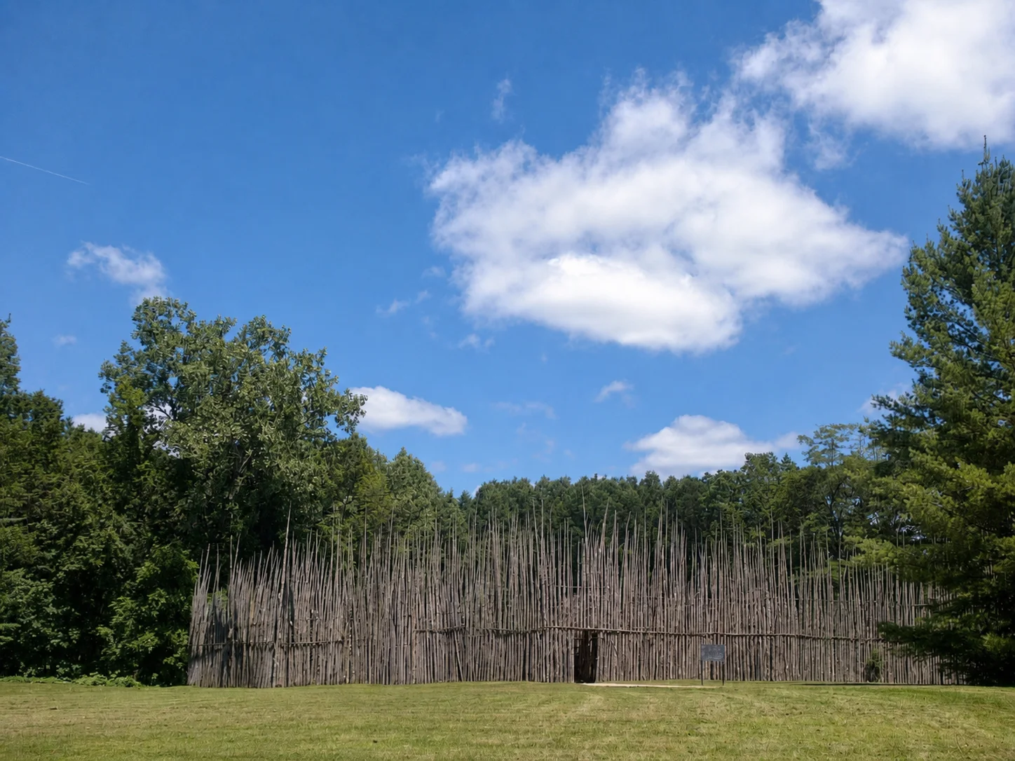 Wooden palisade around the recreated village