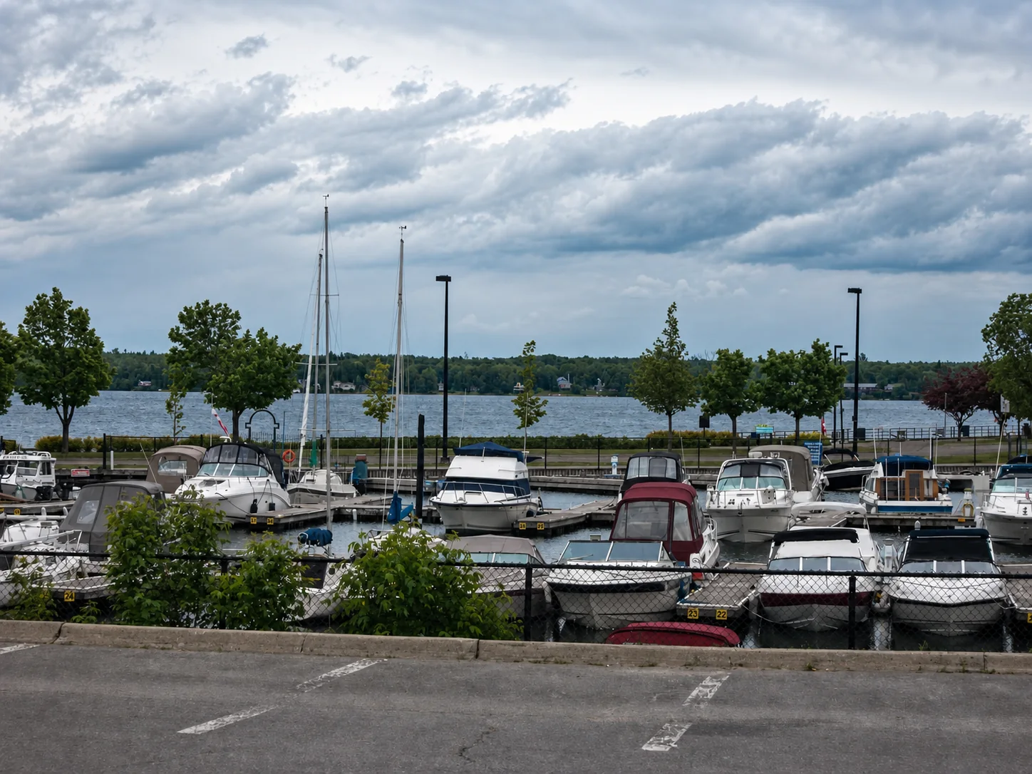 Boats in Brockville marina with the St Lawrence River beyond