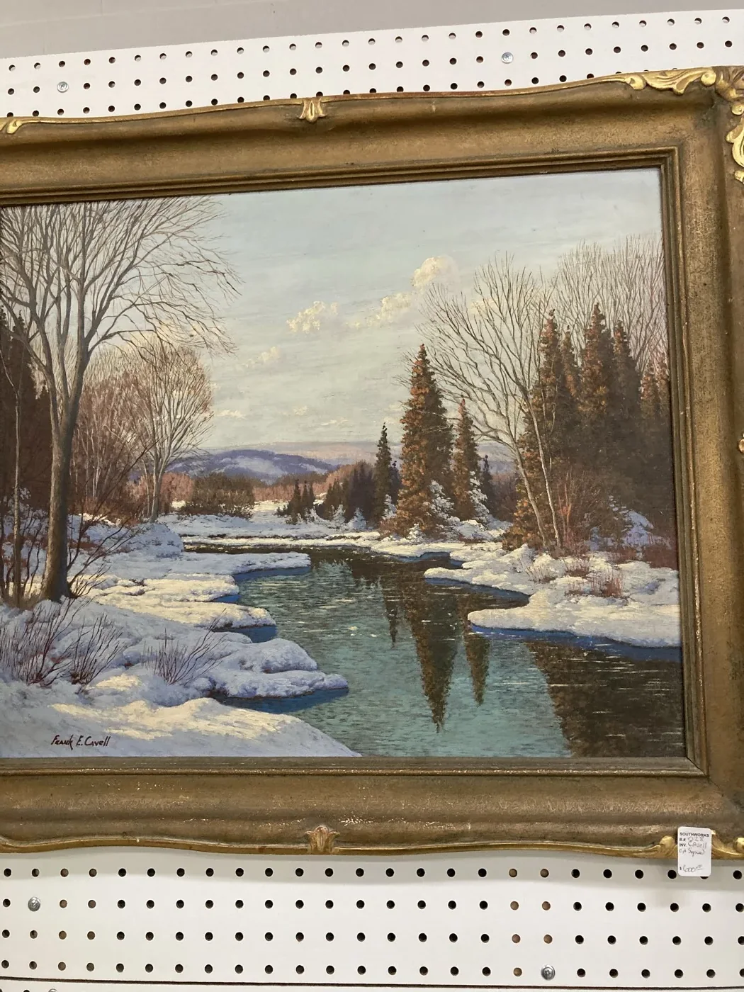 Framed winter river scene on display at Southworks Antiques in Cambridge
