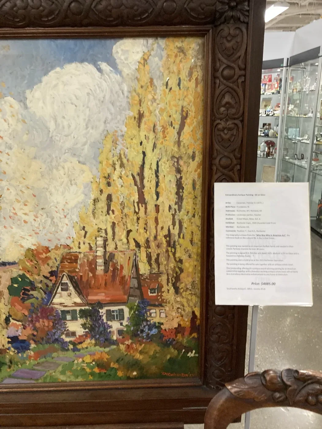 Framed cottage landscape painting on display at Southworks Antiques in Cambridge