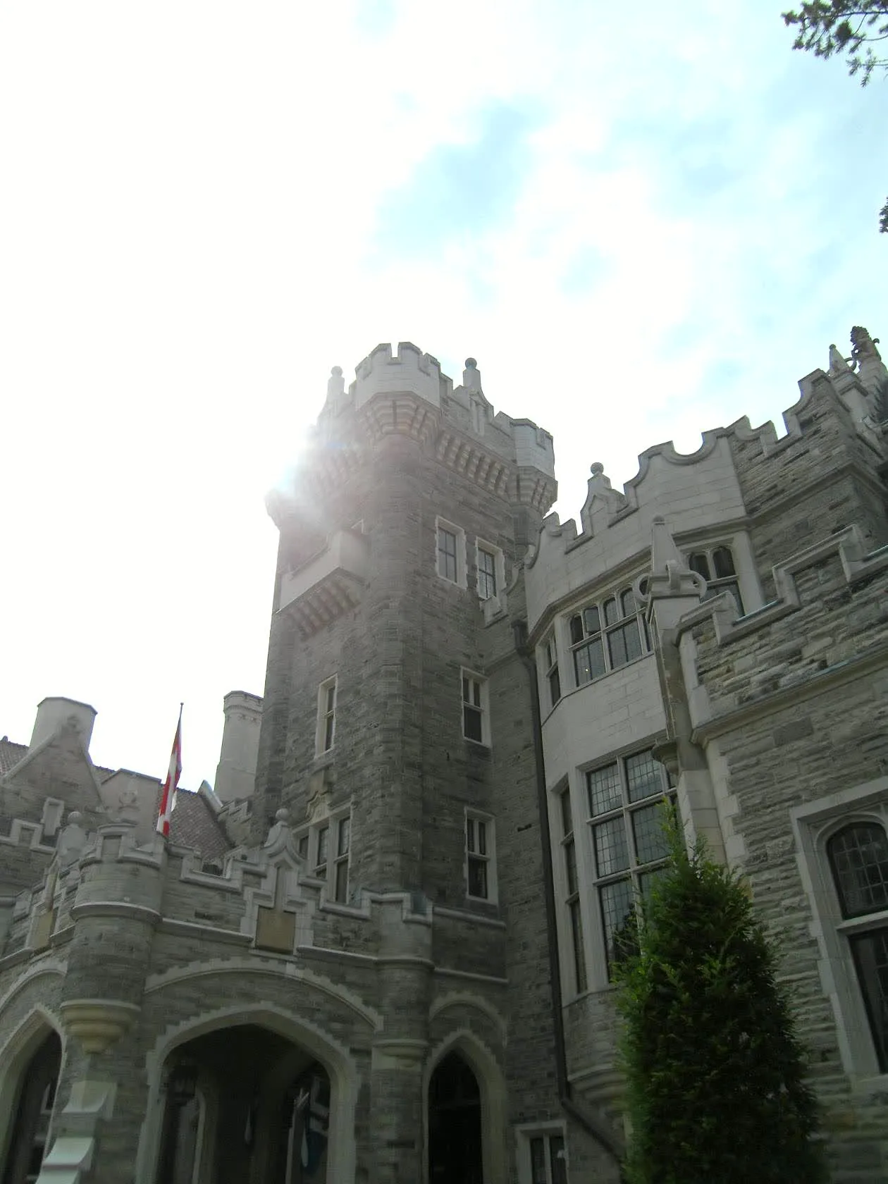 Casa Loma tower viewed upward in sunlight