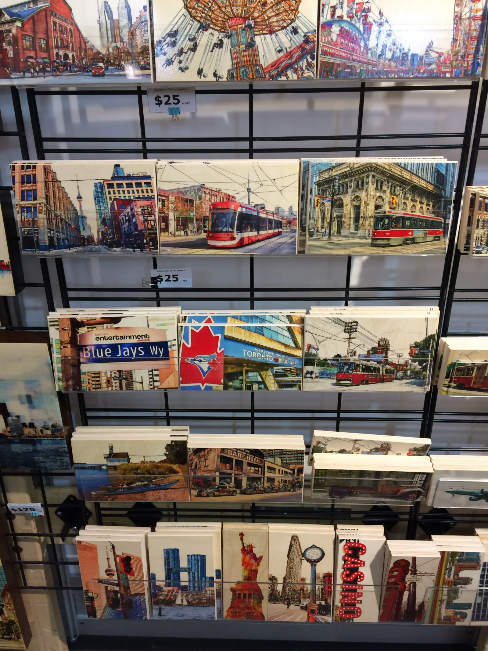 Toronto artwork and postcards for sale at a CNE market display