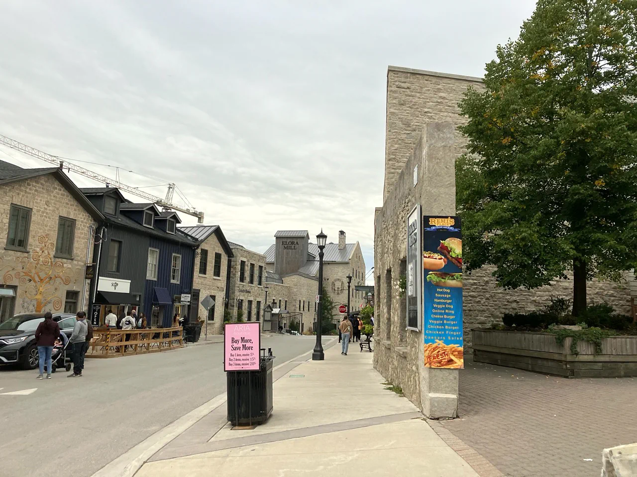 Walkable Elora street with limestone buildings and Elora Mill sign