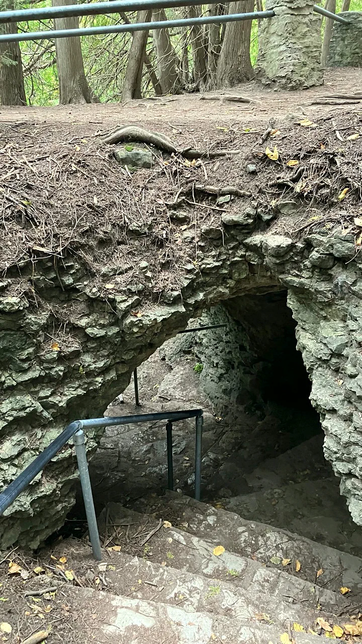 Stone passage and steep handrailed stairs below Victoria Park in Elora