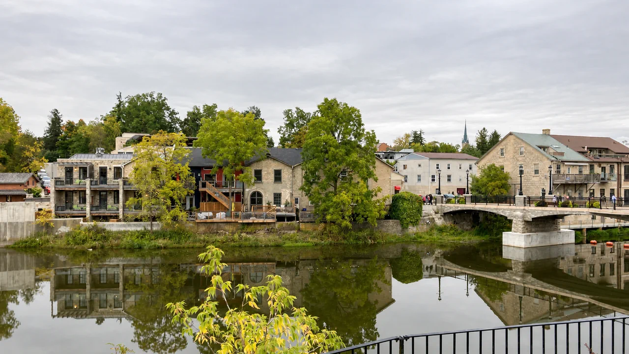 Historic Elora village and bridge reflected in the Grand River