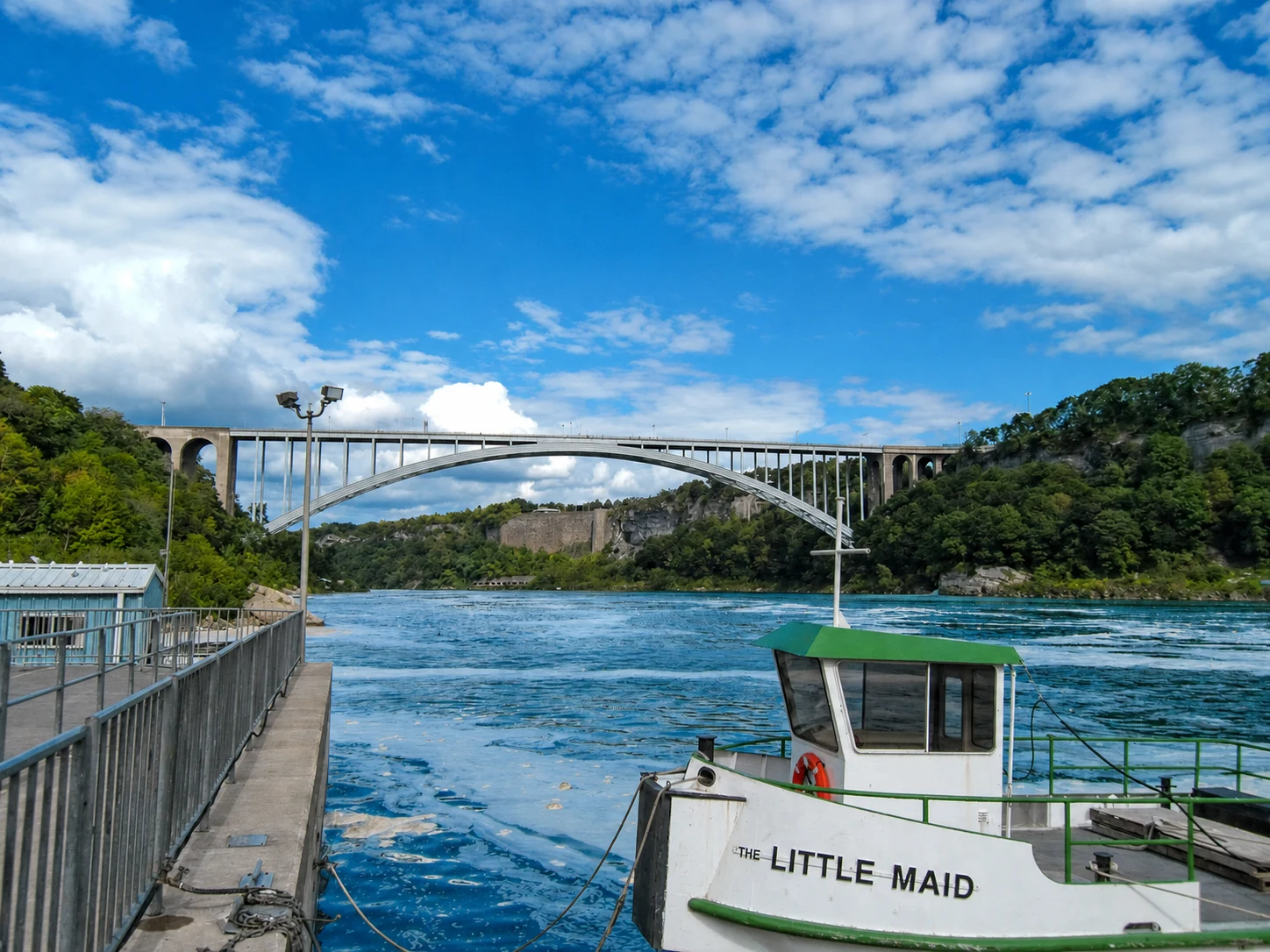 Niagara gorge bridge, landing and boat below the falls