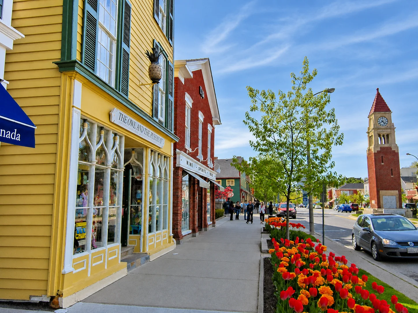 Historic Queen Street storefronts and clock tower in Niagara-on-the-Lake