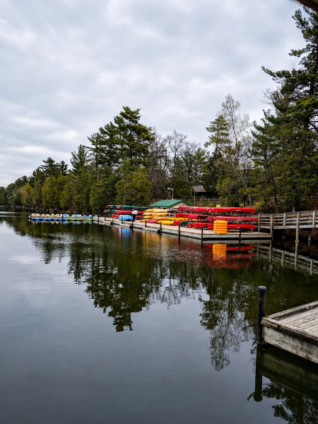 Canoe dock and tree reflections on the Old Ausable Channel