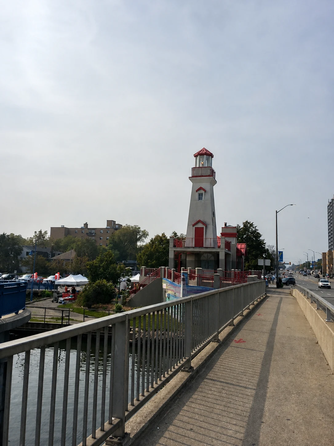 Port Credit lighthouse beside the Lakeshore Road bridge and waterfront path